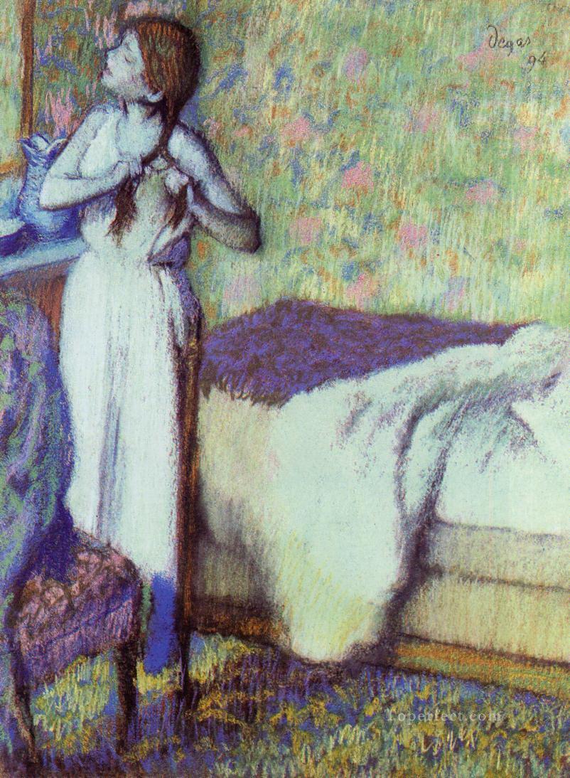 髪を三つ編みにする少女 1894年 エドガー・ドガ油絵